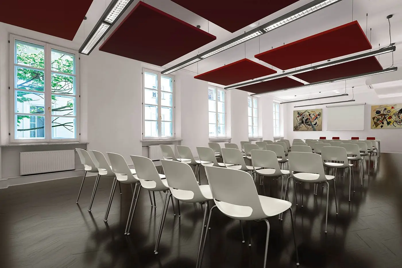 سالن کنفرانس با نورپردازی مناسب و سیستم صوتی حرفه‌ای